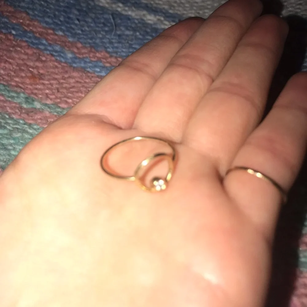 Elegant Gold Ring with Diamond Accent